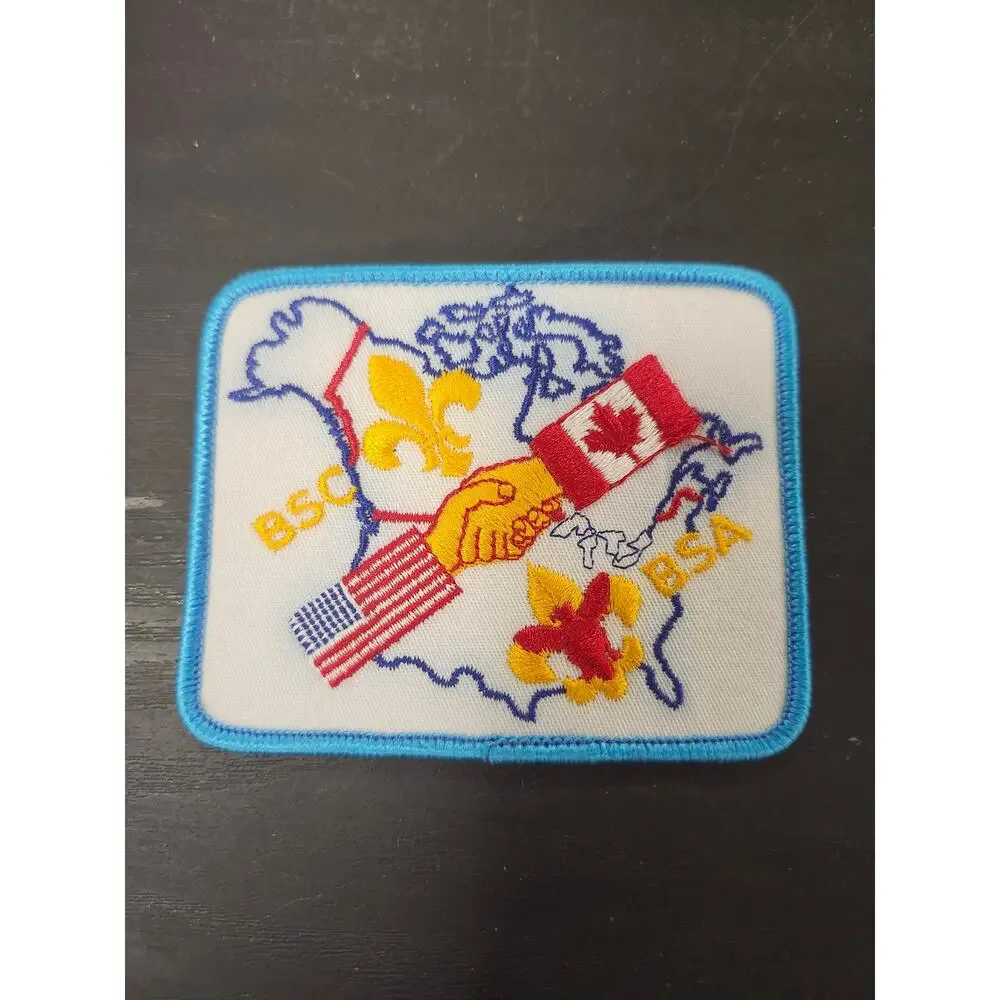 Vtg BSA BSC USA Canada Friendship Patch Scout Emblem Handshake Fleur-de-lis Map